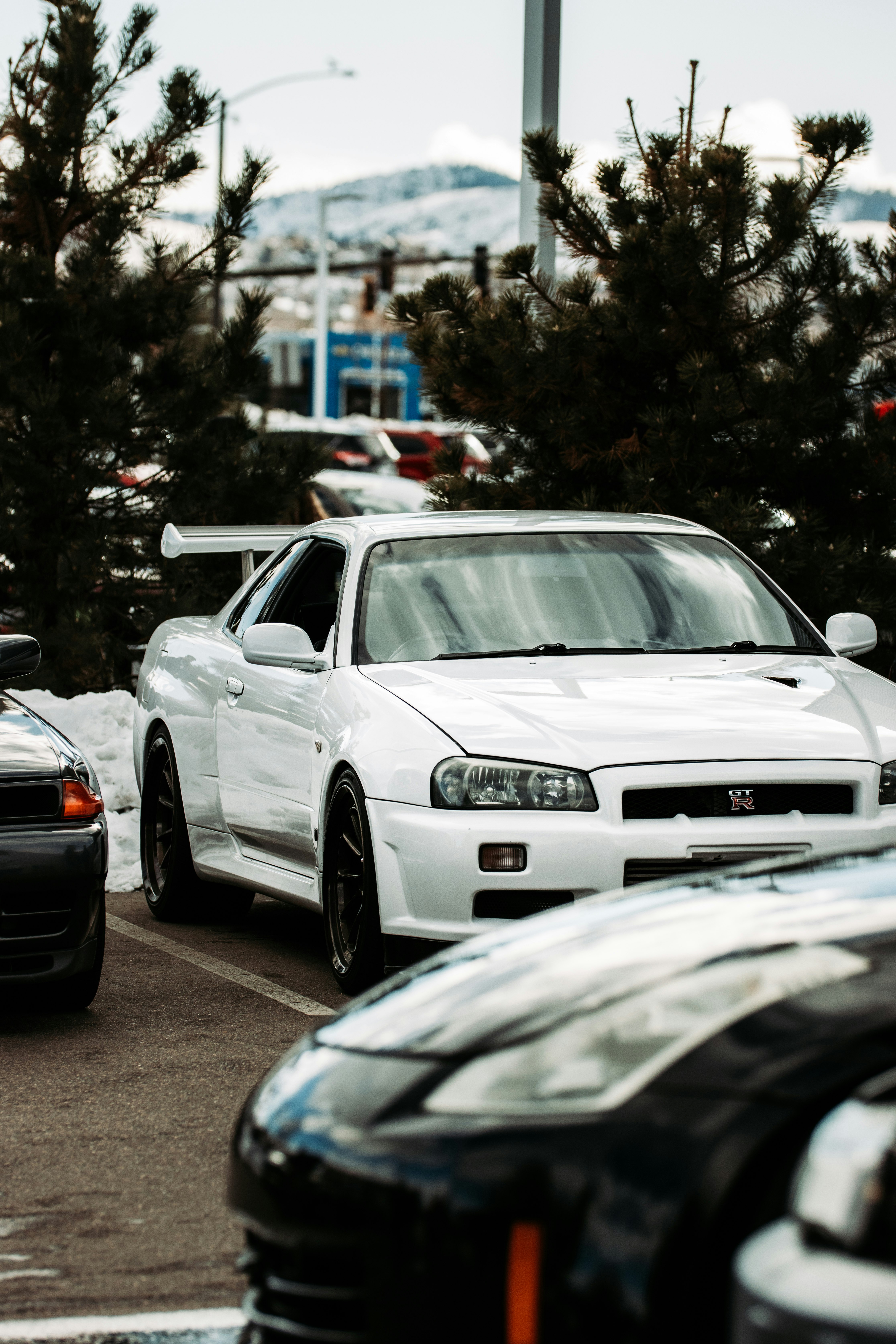 white bmw m 3 on road during daytime